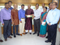 GM of DCM gifted souvenir book to Tofail Ahmed