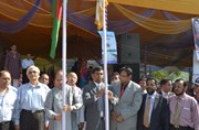 Chief Guest Honorable Governor Dr. Atiur Rahman raising National Flag in Cox ´s Bazar on the occasion of "Bank-NASCIB SME Saikat Utshab-2011" on 11th November 2011