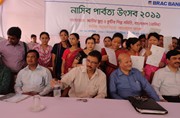 E.D.Chowdhury Mohidul Haque & General Manager of SME & SPD Sukamal Sinha Choudhury with the women entrepreneur in Rangamati NASCIB SME festival, 2011